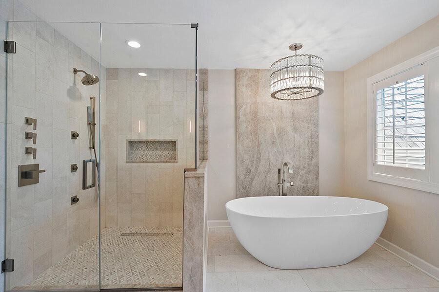 Master bathroom with all glass shower and soaking tub